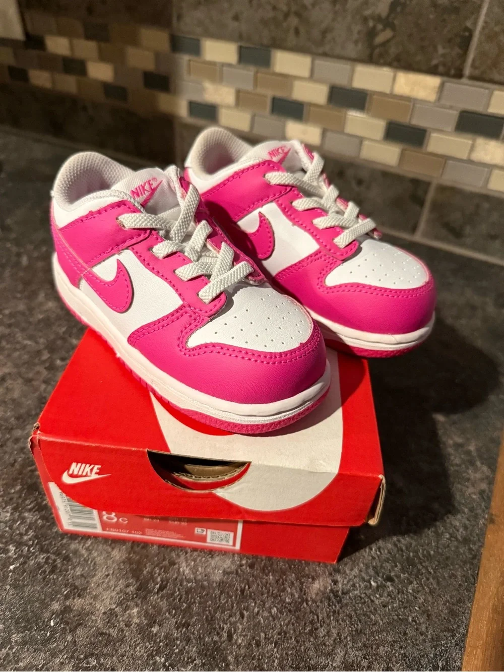 Nike Dunk Low Kids Pink and White Low-Top Sneakers